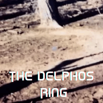 A blurred, desolate landscape with "THE DELPHOS RING" text overlaid.